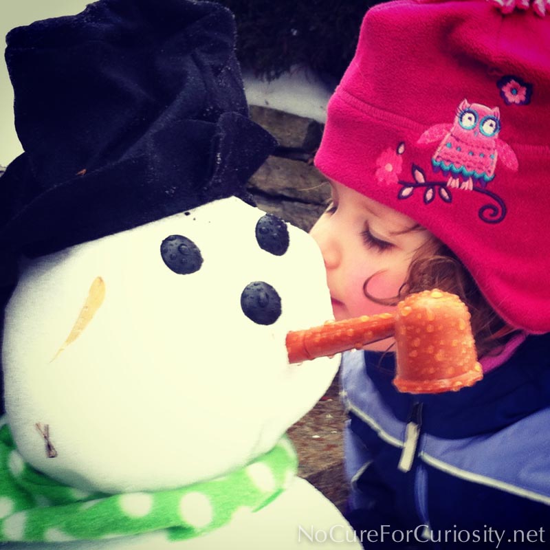 A fleeting kiss for a snowman